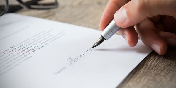 Man Signing